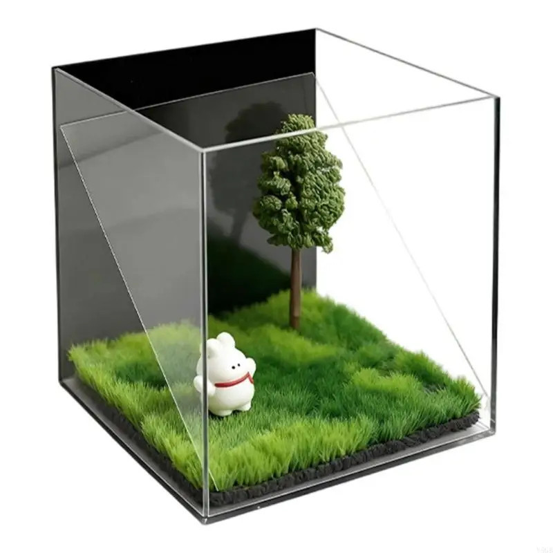 Clear acrylic cube showing the angled reflector and garden