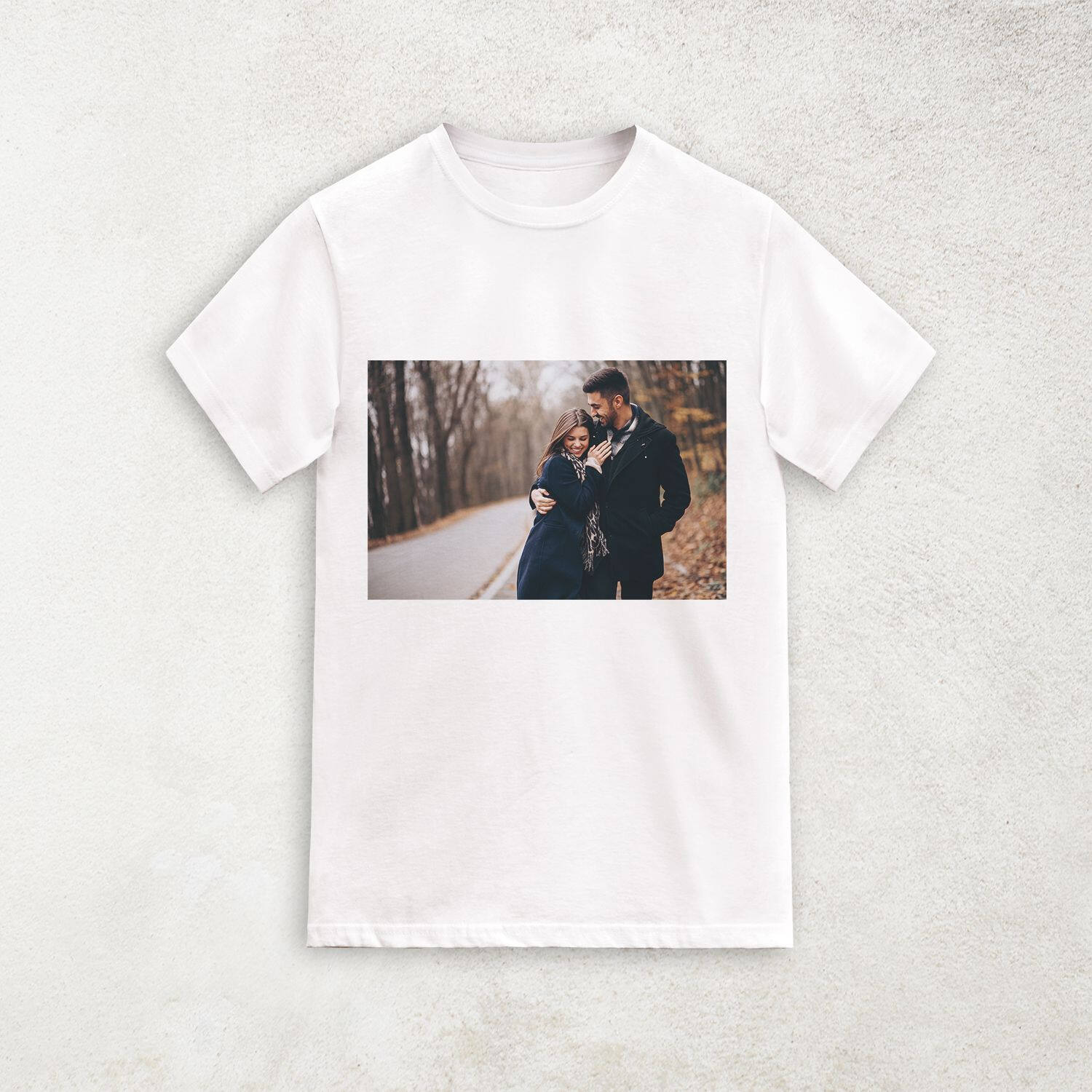 White t-shirt with a couple photo taken in the woods printed across the chest