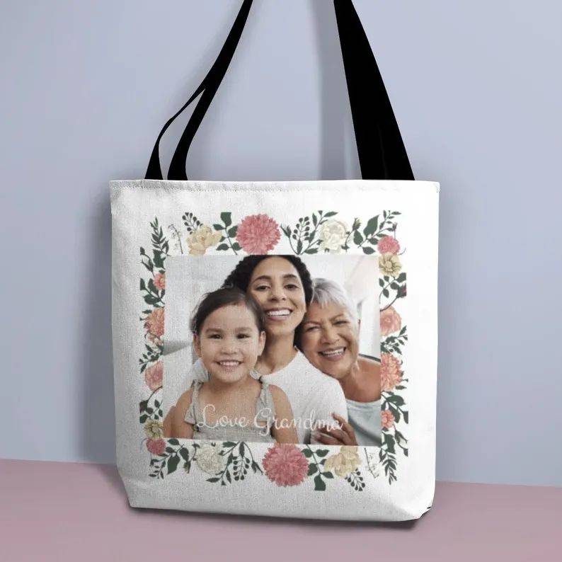 White canvas tote with a grandmother and grandchild photo framed by florals